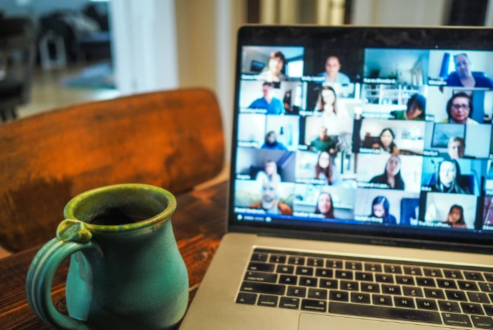 macbook pro displaying group of people